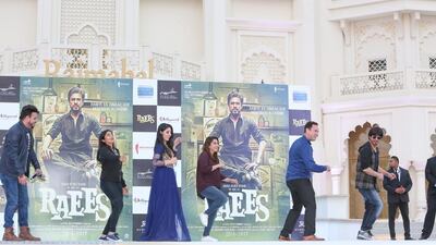 The 51-year-old star delighted fans outside the theatre by mingling with the crowd and posing for photographs. Courtesy Bollywood Parks Dubai