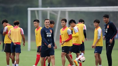 Guangzhou Evergrande coach Fabio Cannavaro, centre, takes part in a training session in Foshan in south China's Guangdong province. Fang Yingzhong/Color China Photo/AP Images