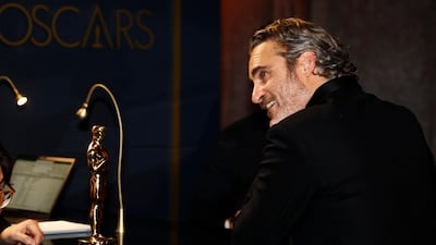 Best Actor Joaquin Phoenix waits for his Oscar statue to be engraved at the Governors Ball at the Governors Ball after the Oscars on Sunday, February 9, 2020, at the Dolby Theatre in Los Angeles. Reuters