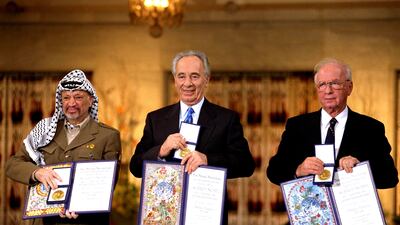From left, Palestinian leader Yasser Arafat, Israeli prime minister Yitzak Rabin and foreign minister Shimon Peres were made joint Nobel Peace Prize winners for 1994 after signing the Oslo Accords. Getty Images