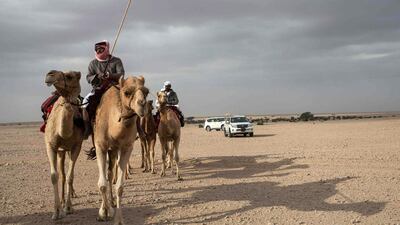 A team of trekkers led by Omani-based British explorer Mark Evans are pictured at the start of the last leg of a 49-day expedition across the world's largest sand desert. The group's trek ended in Doha on January 27, 2016. Olya Morvan/AFP Photo