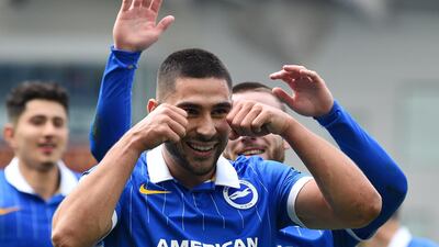 Brighton's Neal Maupay celebrates scoring their first goal. Reuters