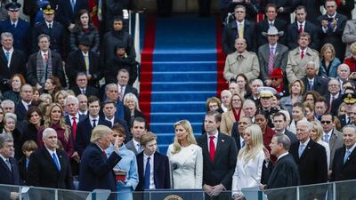 Donald Trump takes the oath of office. Shawn Thew / EPA