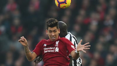 Firmino in action with Newcastle United's Mohamed Diame. Action Images via Reuters