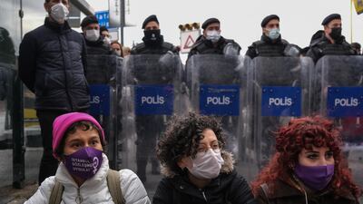 Protesters sit on the ground during the demonstration against Turkey's decision to withdraw from the Istanbul Convention. Turkish President Recep Tayyip Erdogan pulled his country out of the convention, which is an international accord designed to protect women started by the Council of Europe in 2011. EPA