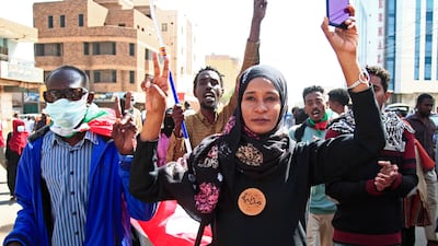 Sudanese rally against a military coup which occurred nearly three months ago, south of the capital Khartoum, on January 17, 2022. - Thousands rallied again in Sudan to oppose a military coup which occurred nearly three months ago but security forces quickly fired tear gas towards them. (Photo by AFP)