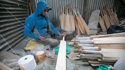 A worker at a bat-manufacturing factory in Halmulla village in south Kashmir. Umer Asif for The National