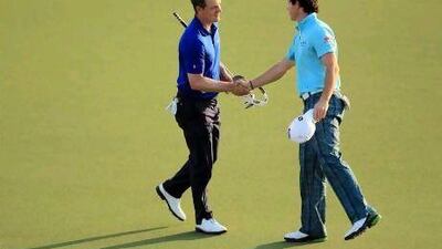 Rory McIlroy, right, replaced Luke Donald, left, to become the fourth world No 1 in 16 months.