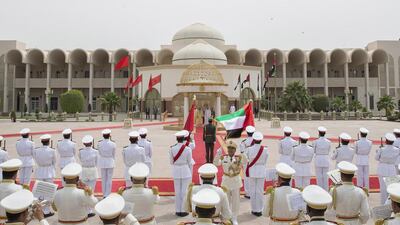 Sheikh Mohammed bin Zayed, Crown Prince of Abu Dhabi and Deputy Supreme Commander of the Armed Forces, centre right, and King Mohammed VI, centre left, stand for the UAE national anthem. Mohamed Al Hammadi / Crown Prince Court - Abu Dhabi