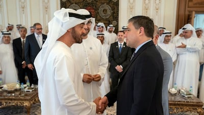 Sheikh Mohammed bin Zayed, Crown Prince of Abu Dhabi and Deputy Supreme Commander of the UAE Armed Forces, receives Lorenzo Simonelli, Chairman, President and CEO of Baker Hughes (right), during a Sea Palace barza. Seen with Dr Sultan Ahmed Al Jaber, UAE Minister of State, Chairman of Masdar and CEO of Adnoc Group (back centre). Courtesy Crown Prince Court - Abu Dhabi