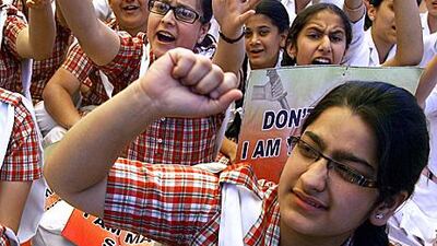 Schoolchildren rally against female foeticide in the Kashmiri city of Jammu last month. The practice is on the rise, even among the more affluent.