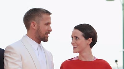 HIT: Looking perfectly co-ordinated, Claire Foy mixed a duo-tone red and pink gown with Messika diamonds, while Ryan Gosling mixed white and cream.
