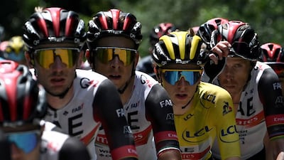 Team UAE Emirates' Tadej Pogacar, wearing the overall leader's yellow jersey.