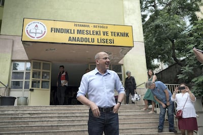 Ahmet Şık, journalist and parliamentary candidate for the HDP party, votes in Istanbul. Photo by Shawn Carrie