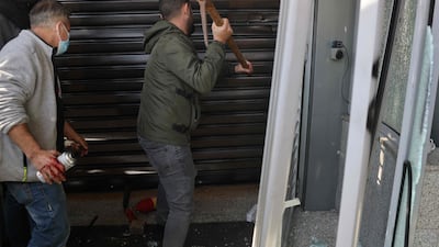Others attempted to break into the banks. AFP