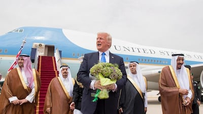 Donald Trump is welcomed by King Salman at King Khalid International Airport in Riyadh, Saudi Arabia, 20 May 2017. Saudi Press Agency / EPA
