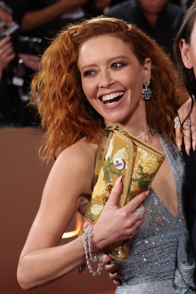 Actress Natasha Lyonne with her Be Good pin on the Golden Globes red carpet. AFP