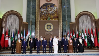 Iraqi President Abdul Latif Rashid and Prime Minister Mohammed Shia Al Sudani pose for a family photo with Arab leaders during the 34th Arab League Summit in Baghdad. Reuters