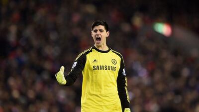 Chelsea keeper Thibaut Courtois celebrates during their League Cup semi-final first leg 1-1 draw with Liverpool on Tuesday. Michael Regan / Getty Images / January 20, 2015