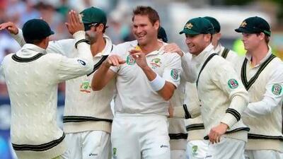 Ryan Harris, centre, took three of England's top-order wickets on Sunday. Andrew Yates / AFP