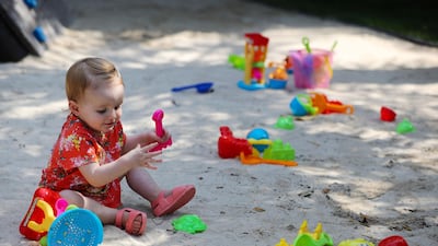 Sophie, 15-months-old, plays in the park that that kept true to its desert surroundings.