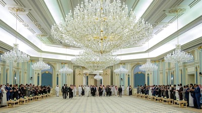 Sheikh Mohamed bin Zayed, Mr Hadi and Prince Mohammed bin Salman at the ceremony. AFP