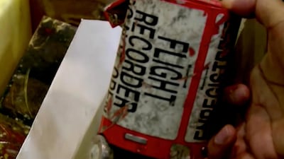 One of the flight recorders reportedly recovered from the crashed Ukrainian airliner in Tehran. Reuters