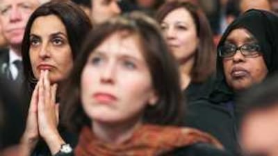 Summit delegates listen to President Barack Obama's speech at the Ronald Reagan Building in Washington on Monday.