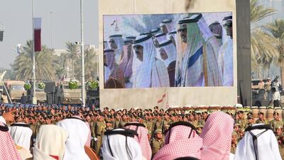 Qatari soldiers participate in a military parade in Doha.