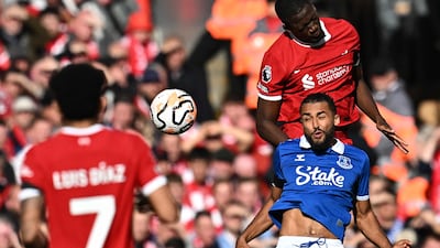 Ibrahima Konate jumps above Everton striker Dominic Calvert-Lewin. AFP