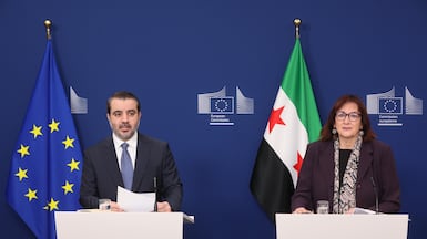 Asaad Al Shibani speaks alongside Dubravka Suica, European Commissioner for the Mediterranean, in the Belgian capital Brussels. EPA
