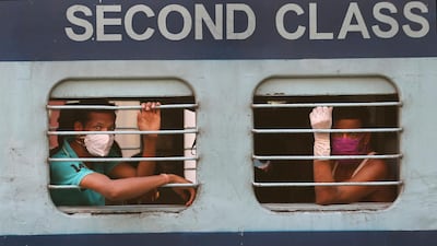 Indian migrant workers onboard a train in Hyderabad, India as they return to their villages, May 23. Mahesh Kumar A/ AP