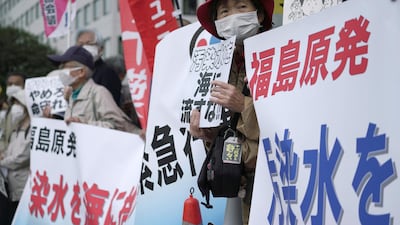People protest against government's decision to start releasing massive amounts of treated radioactive water from the wrecked Fukushima nuclear plant into the sea, during a rally outside the prime minister's office in Tokyo. AP