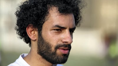 The "Mohamed Salah of Iraq" can't leave his house without being stopped for photographs or approached by football fans who mistake him for the Egyptian star. Sabah Arar / AFP