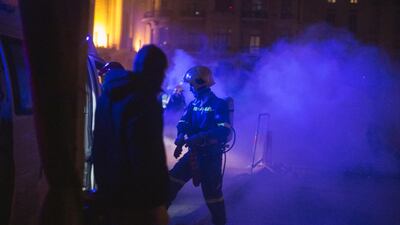 Teargas engulfs Red Cross medics as anti government protesters and riot police clash during a second day of violence. Getty Images