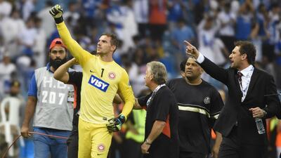 Goalkeeper of Western Sydney Wanderers Ante Covic, left, celebrates after winning the Asian Champions League 2014 with a 0-0 draw against Saudi Arabia's Al Hilal in the second leg of the AFC Champions League football final at King Fahad stadium in Riyadh, on November 1, 2014. AFP / FAYEZ NURELDINE
