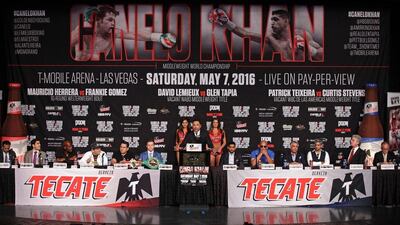 Promoter Oscar De La Hoya addresses the media and assembled guests. John Gurzinski / AFP