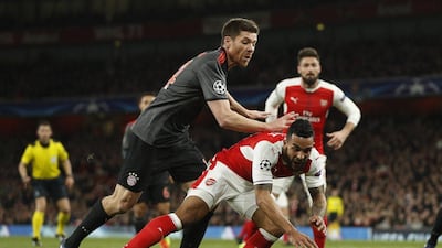 Xabi Alonso most recently played his part in Bayern Munich's 10-2 aggregate victory over Arsenal in the Uefa Champions League. John Sibley / Reuters