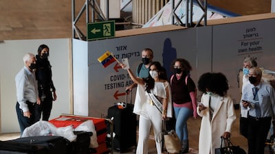 Miss Universe contestants arrive at Israel's Ben Gurion Airport in Lod, east of Tel Aviv, on November 28, 2021. AFP