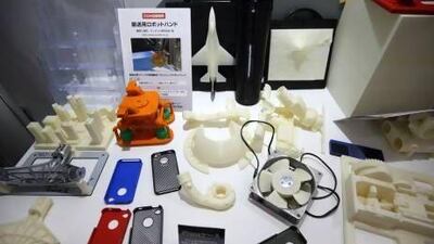 Products made by 3D printers are displayed at the Stratasys booth at the 3D & Virtual Reality Exhibition in Tokyo. Stratasys agreed to buy MakerBot Industries for at least $403 million in June. Tomohiro Ohsumi / Bloomberg News