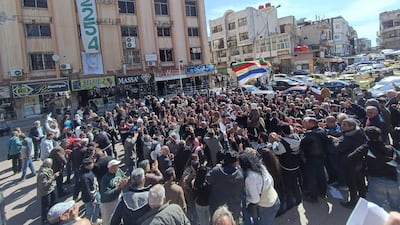 A demonstration against Syrian President Bashar Al Assad, in the mostly Druze southern city of Suweida. AFP