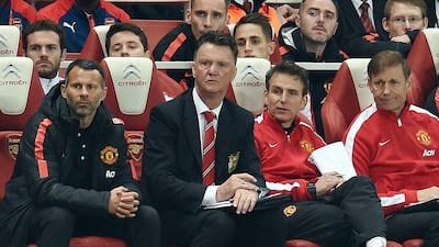 Manchester United manager Louis van Gaal observes his side during their 2-1 win over Arsenal at Old Trafford on Saturday in the Premier League. Andy Rain / EPA / November 22, 2014