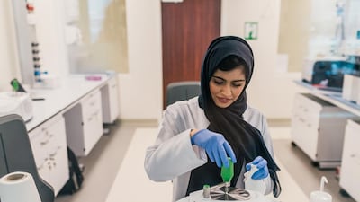 Forensic chemistry assistant Salama bin Ghelaitah is one of the many female staff members who work at Dubai’s General Department of Forensic Science and Criminology. Alex Atack for The National