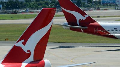 Qantas has said it will start voluntary redundancies of pilots as it aims to cut costs. Torsten Blackwood / AFP