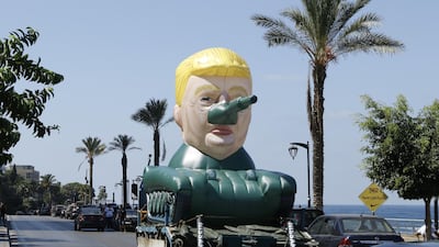 The inflated tank topped with Trump's head has been roaming Beirut's streets and is part of an upcoming exhibition in the Lebanese capital, by a Syrian artist who uses the pseudonym Saint Hoax. Photo Saint Hoax