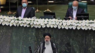 Iran's newly elected President Ebrahim Raisi (centre) speaks at his swearing in ceremony at the Iranian parliament in the capital Tehran.