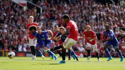 Manchester United's Marcus Rashford scores a penalty against Leicester. AFP