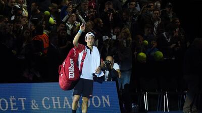 Kei Nishikori acknowledges the crowd at London's 02 Arena after losing in the semi-finals to Novak Djokovic at the ATP World Tour Finals on Saturday. Tim Ireland / AP / November 15, 2014