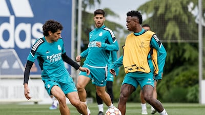 Vinicius Junior with Jesus Vallejo and Marco Asensio at Valdebebas training ground in Madrid. Getty