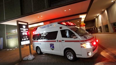 An ambulance is seen in front of a hotel following a strong earthquake in Iwaki, Fukushima prefecture, Japan February 13, 2021. REUTERS